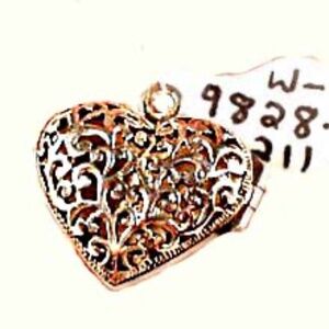 LOCKET, STERLING SILVER, HEART SHAPE OPENS FULLY, HAS TURQUOISE GEM ON ONE SIDE,